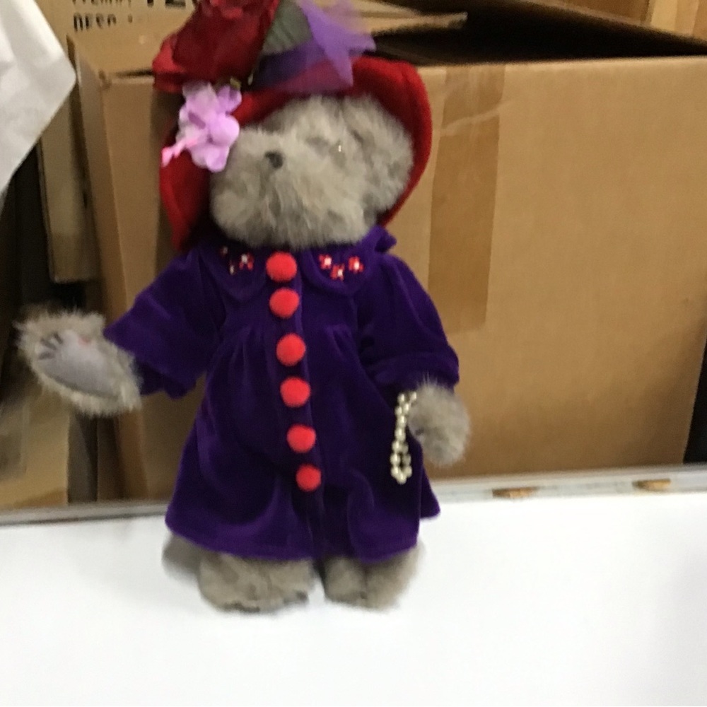 New grey bear red hat purple dress